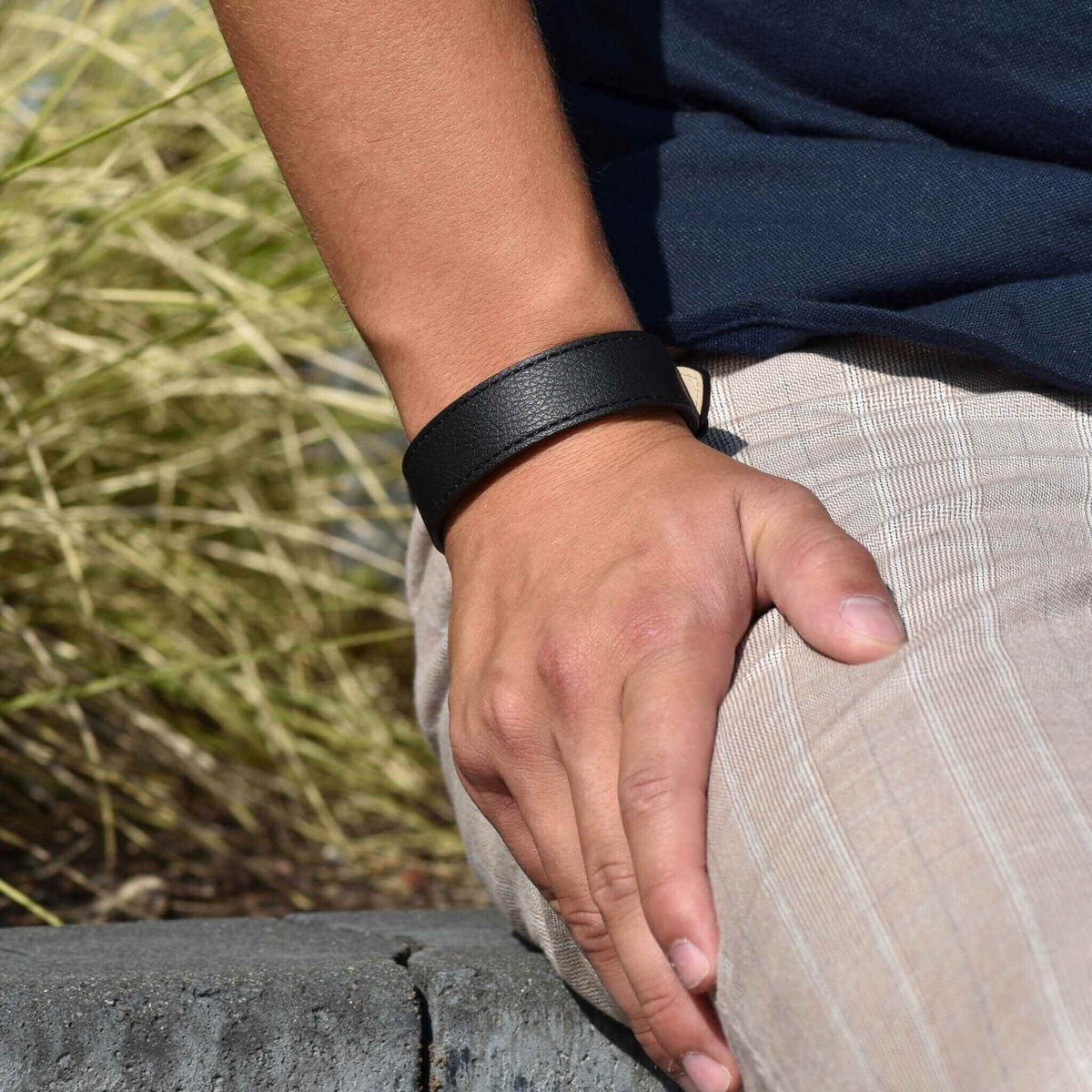 Astari x Bybit contactless payment bracelet made from sustainable apple leather, worn on a wrist.
