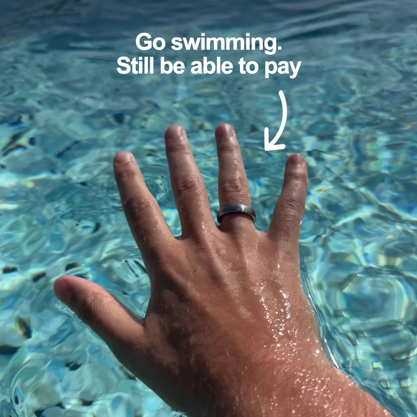 Silver Atlantis payment ring worn while swimming