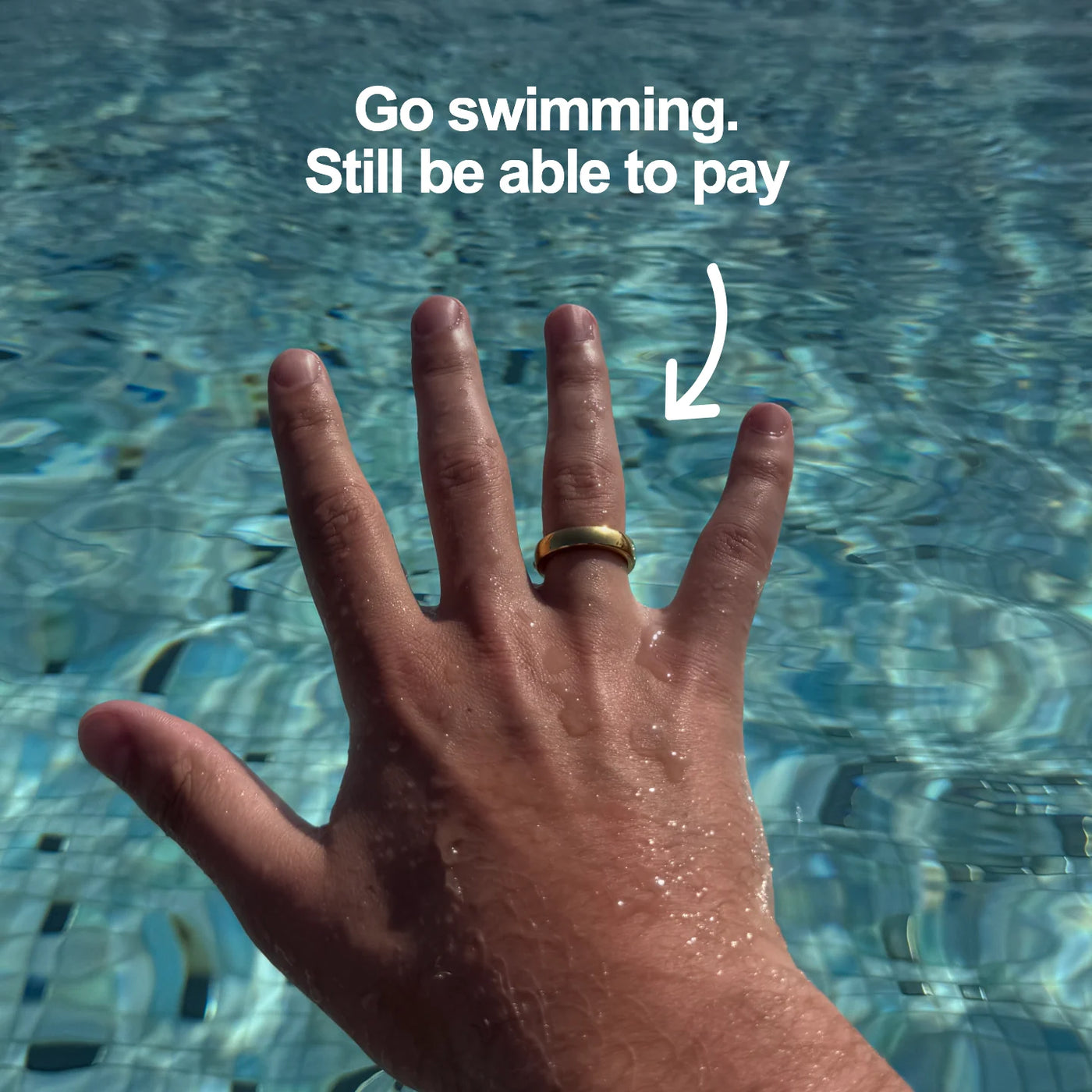Gold Atlantis payment ring worn while swimming