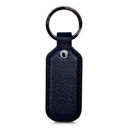 Black Astari Achilles payment keychain wearable made of vegan apple leather for contactless payments, rear image.